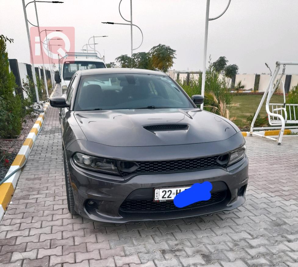 دۆج چارجەر